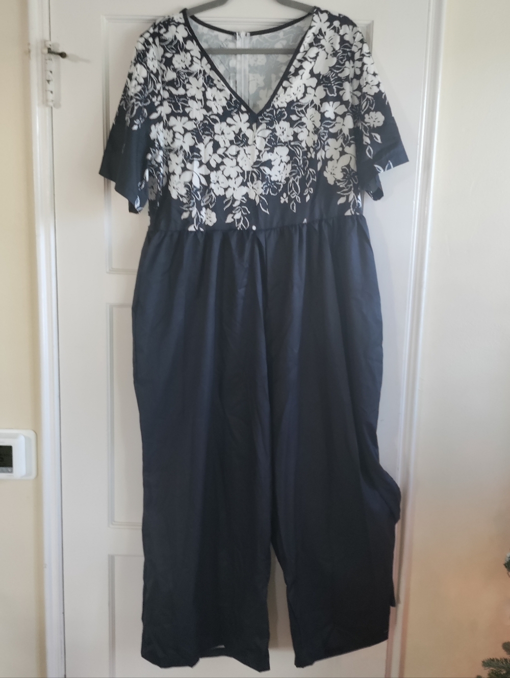 ✨ 4/$15 Black Jumpsuit with White Floral Bodice